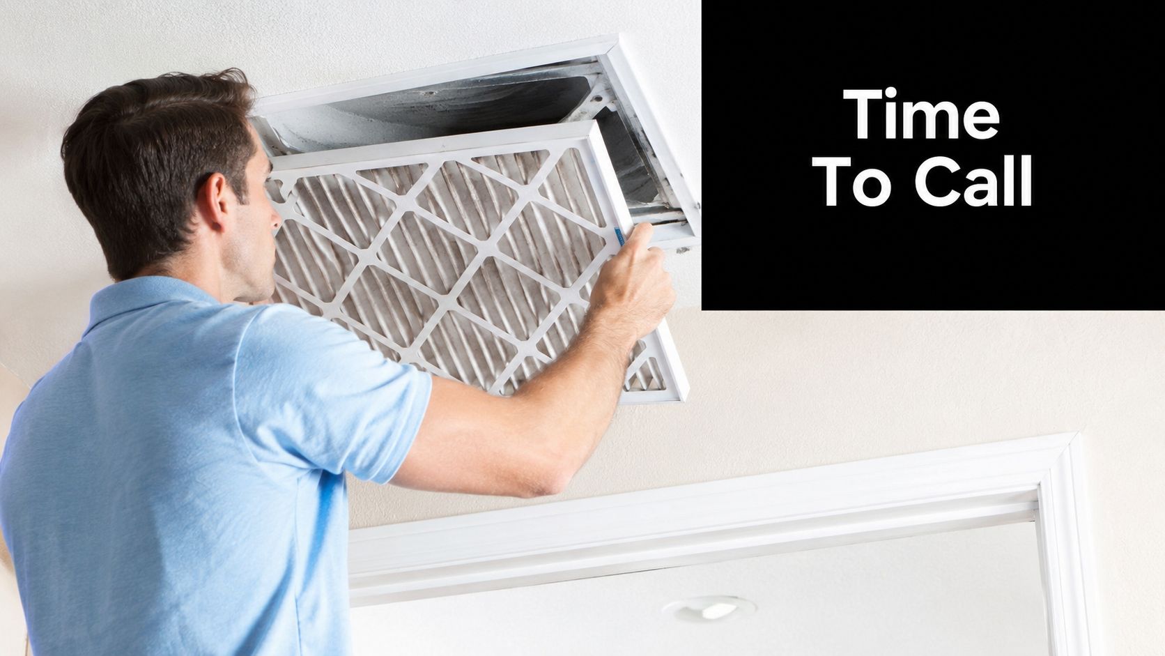 A technician replaces an old, dirty air conditioning filter in a residential ceiling unit.